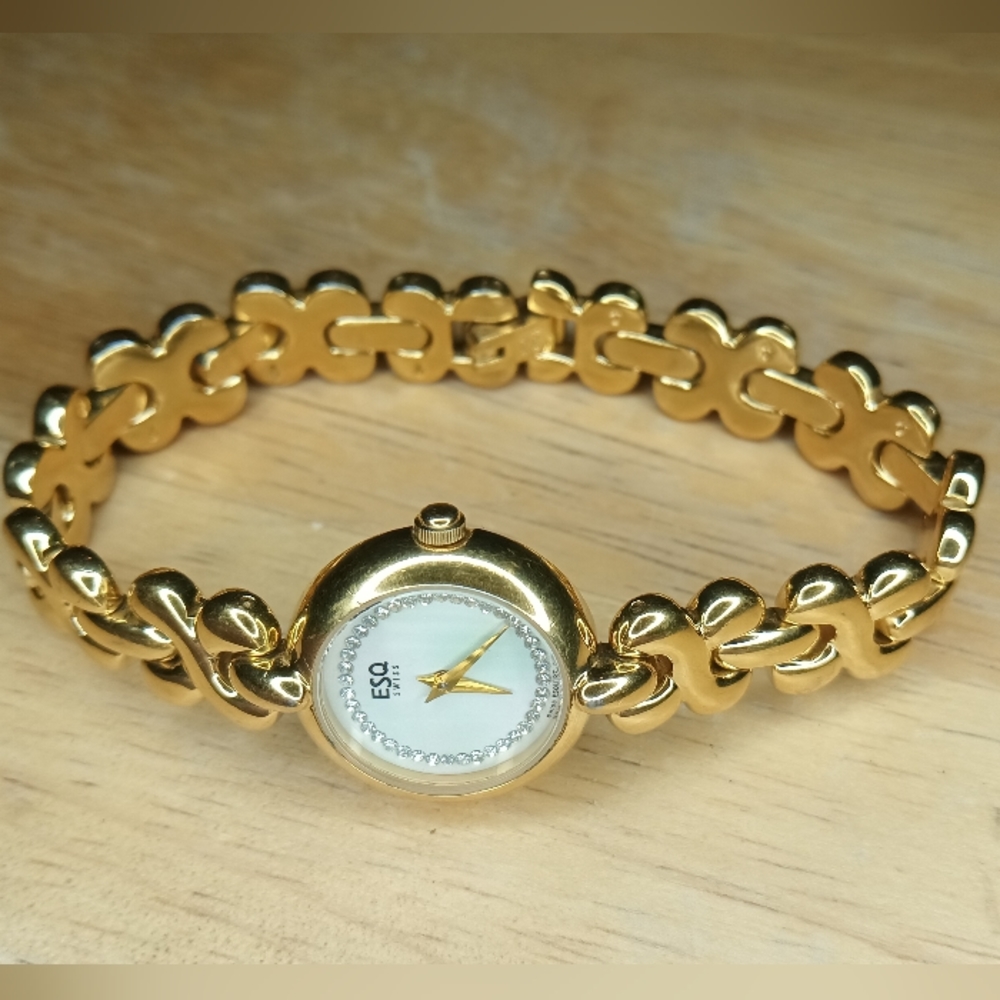 X Esquire Ladies Quartz watch, MOP face jeweled ring, gold hands, model 1